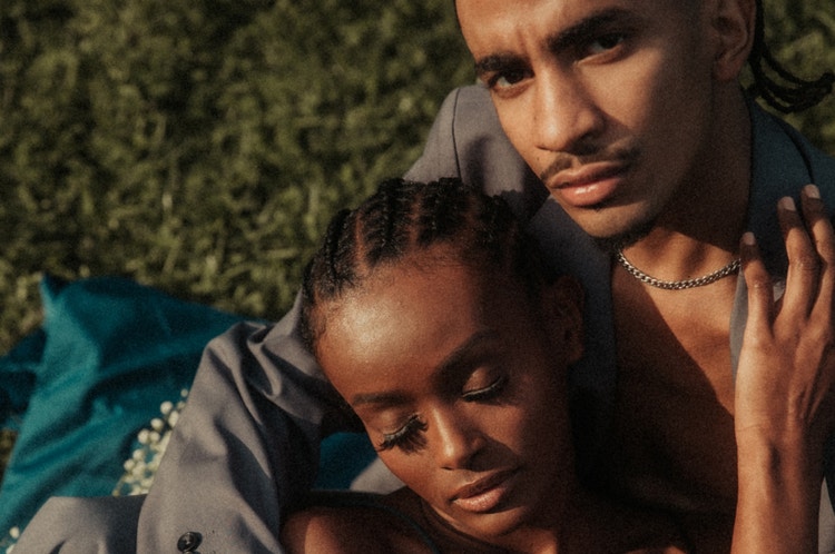 portrait of a couple in cornrows