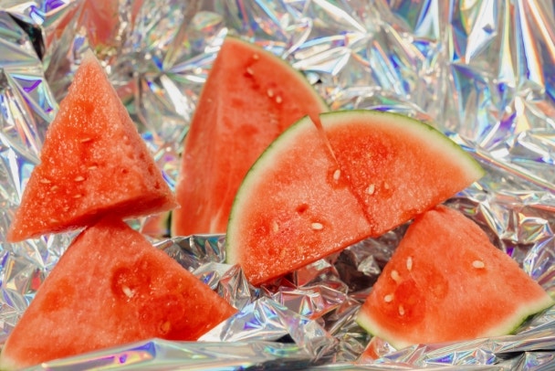 Sliced watermelon with chrome background