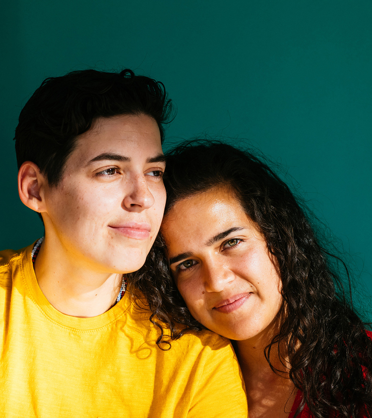 Nonbinary couple, nonbinary person in yellow shirt