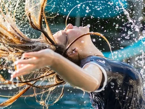 13 year old girl in swimming pool By Marc Romanelli